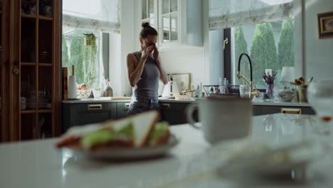 woman preparing breakfast in a cozy kitchen