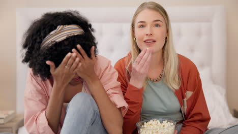 Scary,-movie-and-women-friends-on-bed-watching-tv