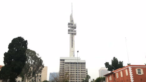 telecommunication tower in a cityscape