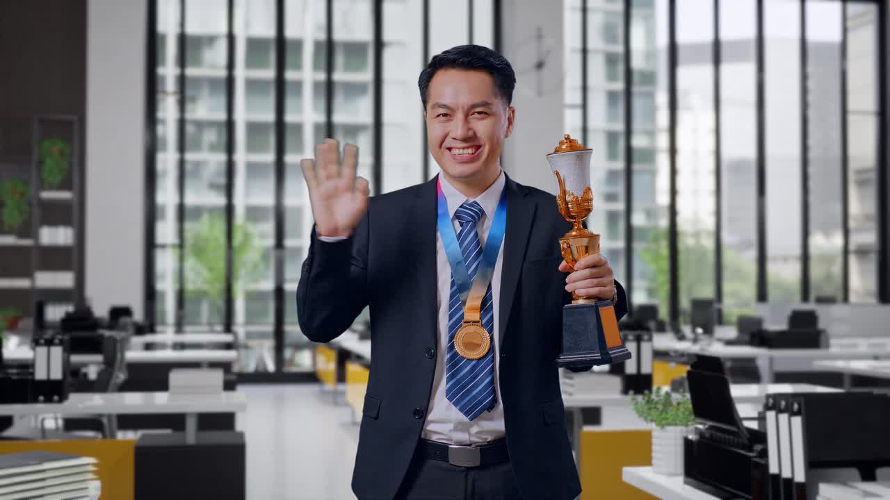 Businessman Celebrating Achievement with Trophy