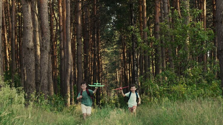 Kids playing with toys in the forest