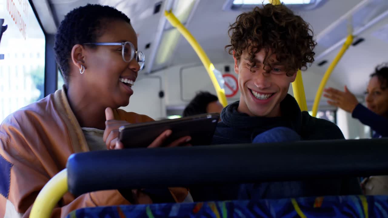Couple interacting with each other while travelling in bus 4k