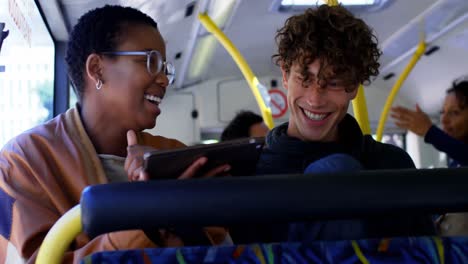 Couple-interacting-with-each-other-while-travelling-in-bus-4k