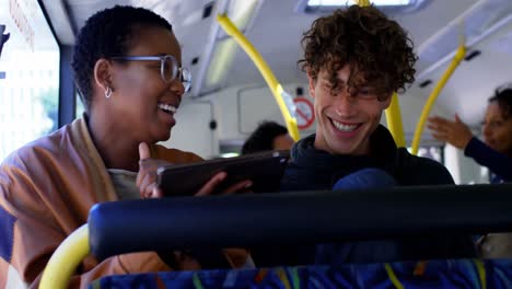 couple interacting with each other while travelling in bus 4k