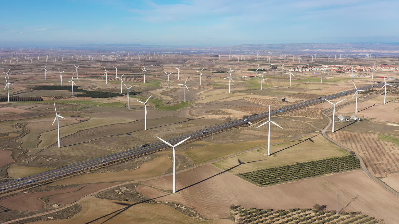 Wind turbines endless fields green power plant Spain Saragossa
