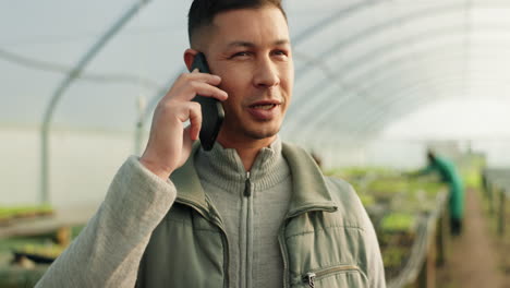 farmer, phone call and greenhouse