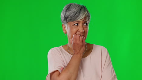 Green-screen,-anxiety-and-senior-woman-bite-nails