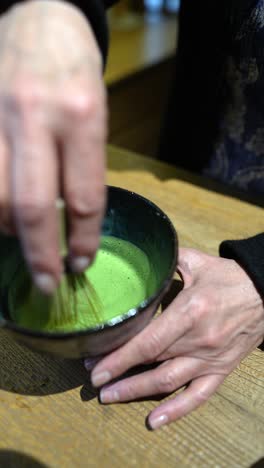 preparing matcha green tea