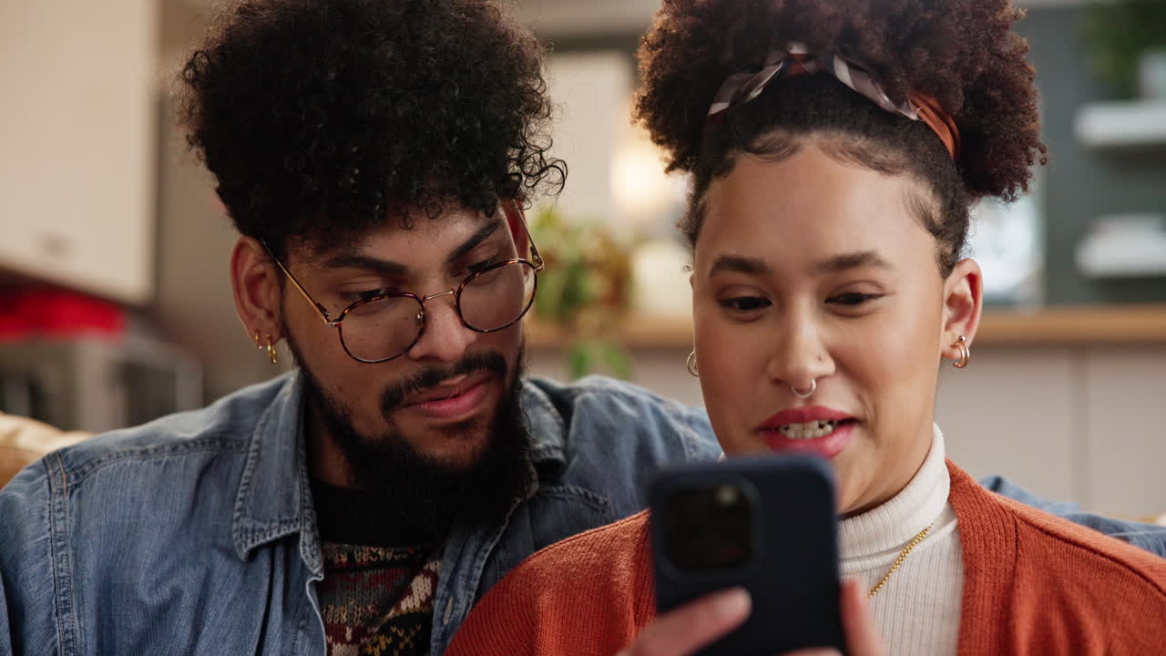 Couple looking at phone together