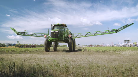 agricultural sprayer transformed after watering works on field. spraying machine