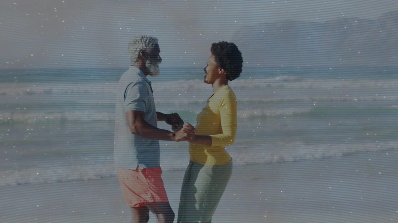 Couple meeting waves, holding hands and swaying, starbursts appearing around couple for health
