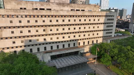 unidentifiable government building with american flag