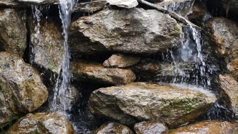 small waterfall feature with rocks