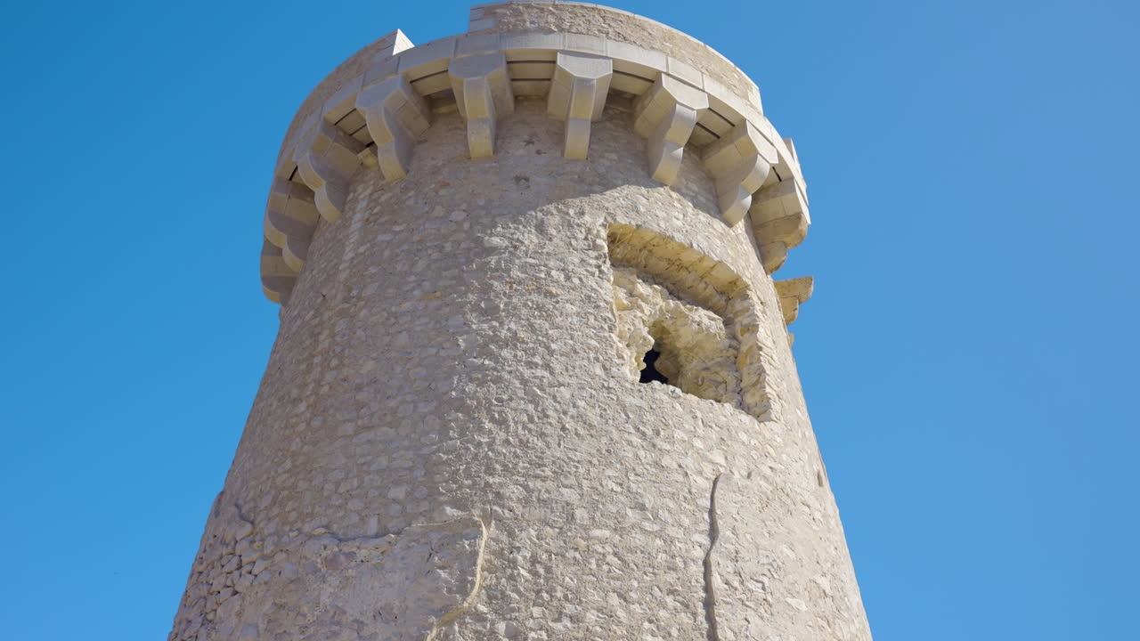 Damaged Stone Tower with Missing Window
