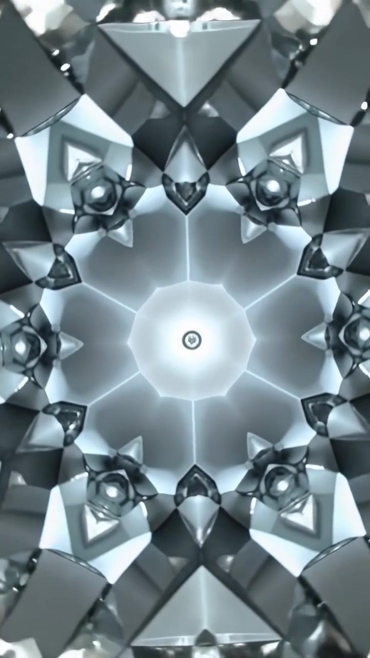 Video verticale: Motivo metallico rotante che reagisce a un fascio di luce, con un hub ottagonale pulsante e nodi sullo schermo.