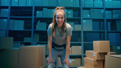 happy warehouse worker with boxes