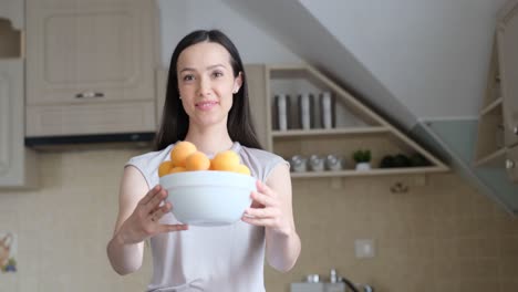 beautiful woman adopting a vegan lifestyle holding fresh fruit in her hands beautiful woman adopting a vegan lifestyle holding fresh fruit in her hands beaming joy into the lens a testament to the power of a balanced healthy diet and positive change