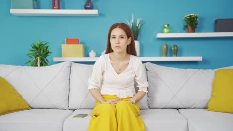 Young-woman-looking-at-camera-confused.