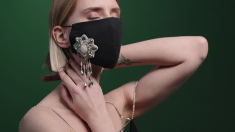 stylish woman in high-fashion face mask