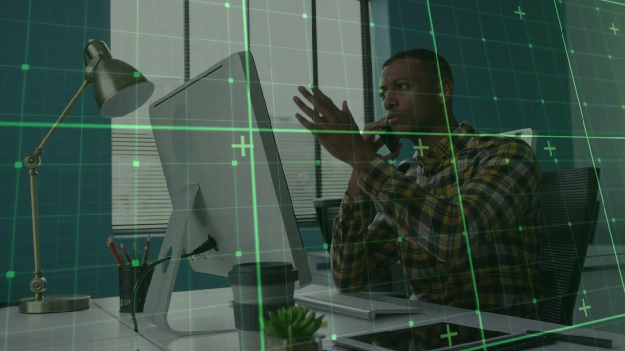 Staff taking business call, leaning and gesturing while green grid framing hands and screen