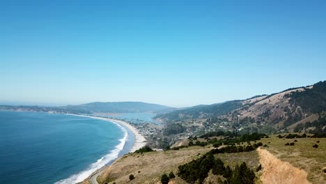 drone shot revealing the beautiful stinson beach in california, usa on a gorgeous sunny afternoon
