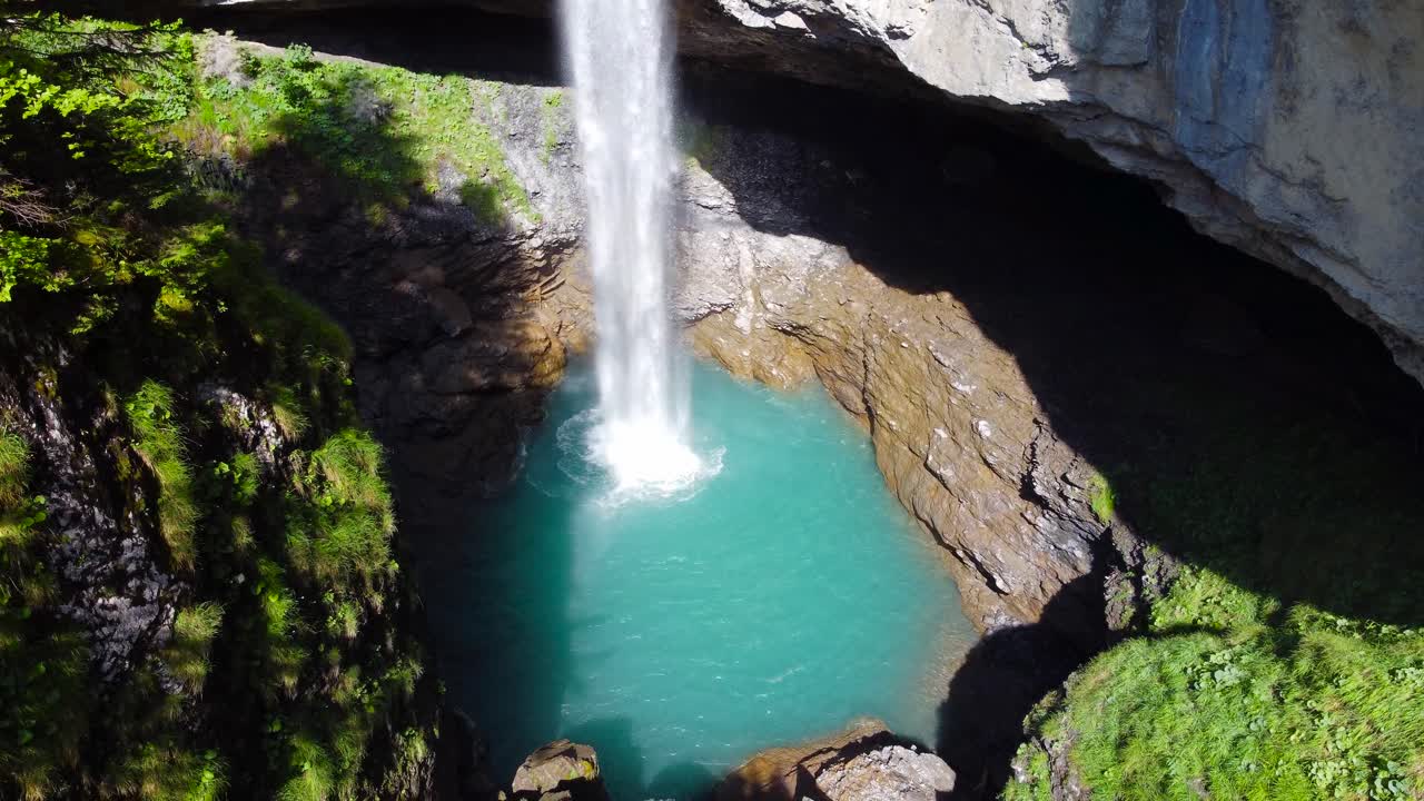 Stunning Aerial Shot of Berglist&uuml;ber Waterfall in Switzerland