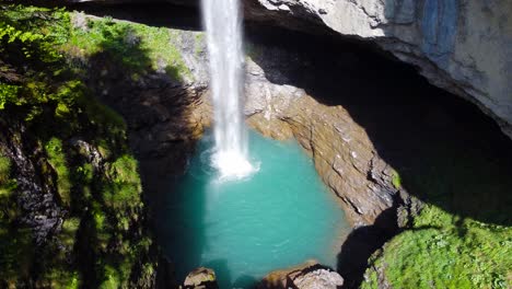 Stunning-Aerial-Shot-of-Berglistüber-Waterfall-in-Switzerland