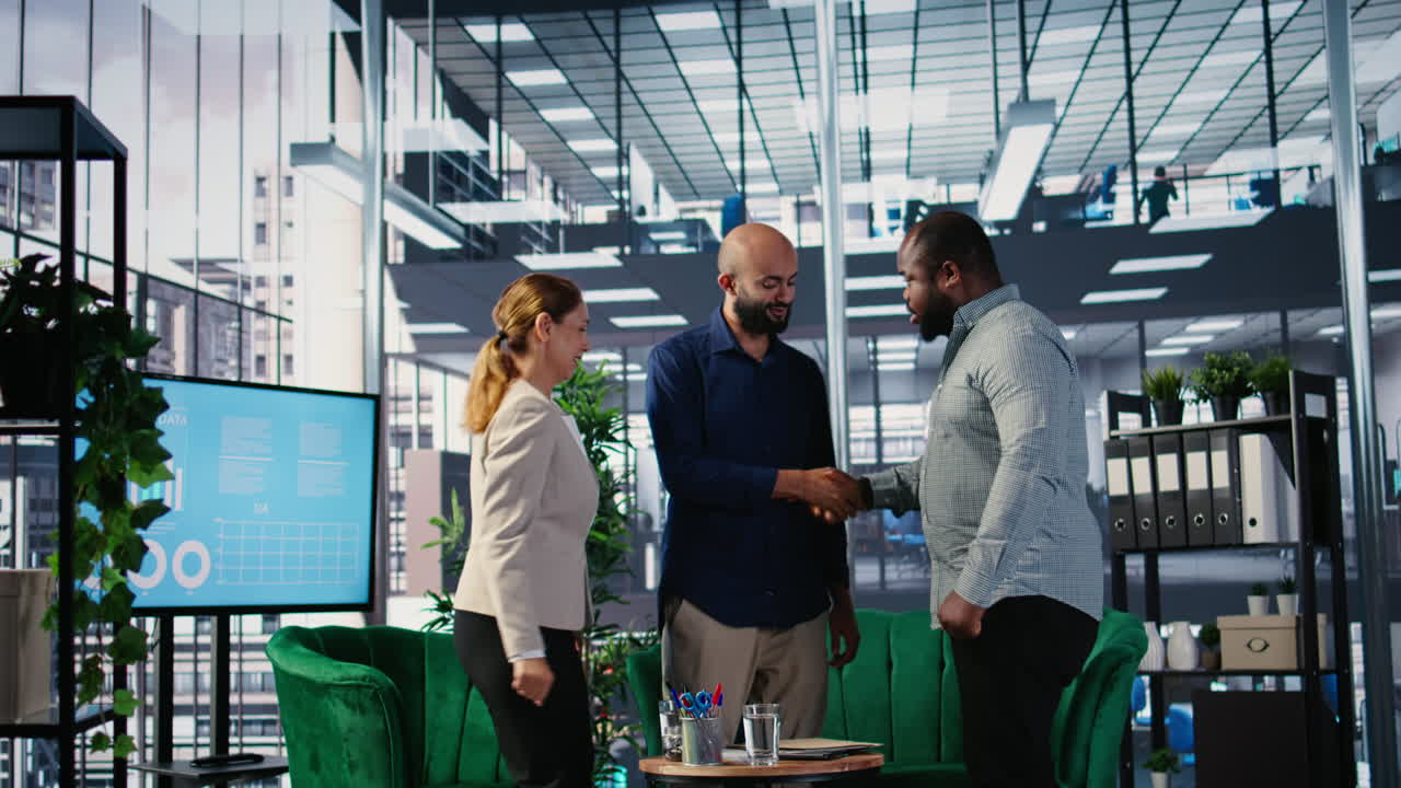 Vertical Video Diverse business leaders greeting each other in a conference room
