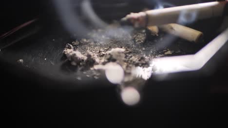 Close-up-smoking-cigarette-on-man-hand