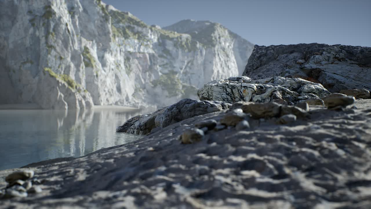 포르투갈 의 대서양 해안 에 있는 바위 들 사이 에 있는 모래 해변