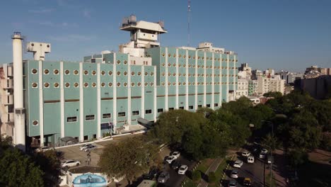 drone moving towards building of naval hospital, buenos aires, argentina