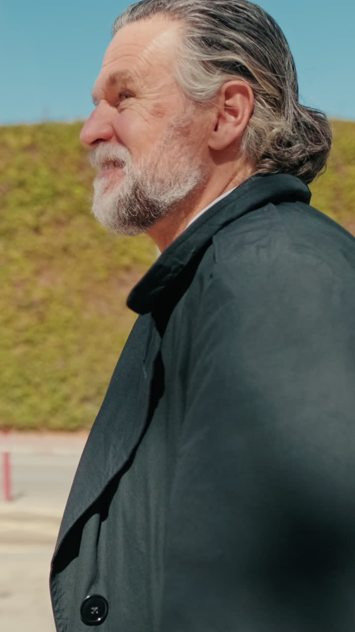 Mature Man Strolling Through City Streets