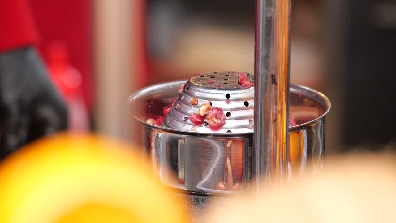 Making Pomegranate Juice