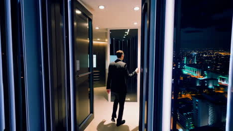 Businessman in a Modern Skyscraper at Night