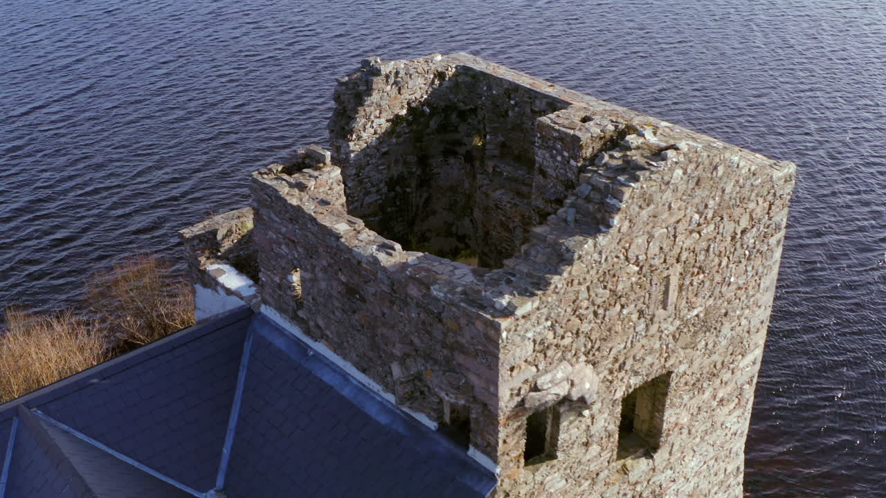 Aerial orbit of Ballynahinch Castle on the Lake, highlighting its architectural features. Connemara, Galway