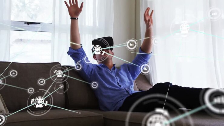 Animation of network of connections with icons over businessman wearing vr headset