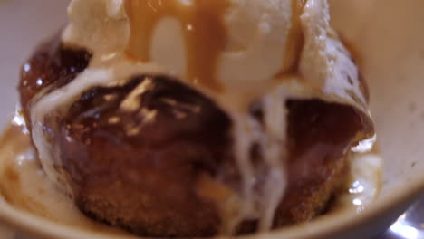 Luscious-English-Homemade-Pudding-Topped-With-Ice-Cream-And-Caramel