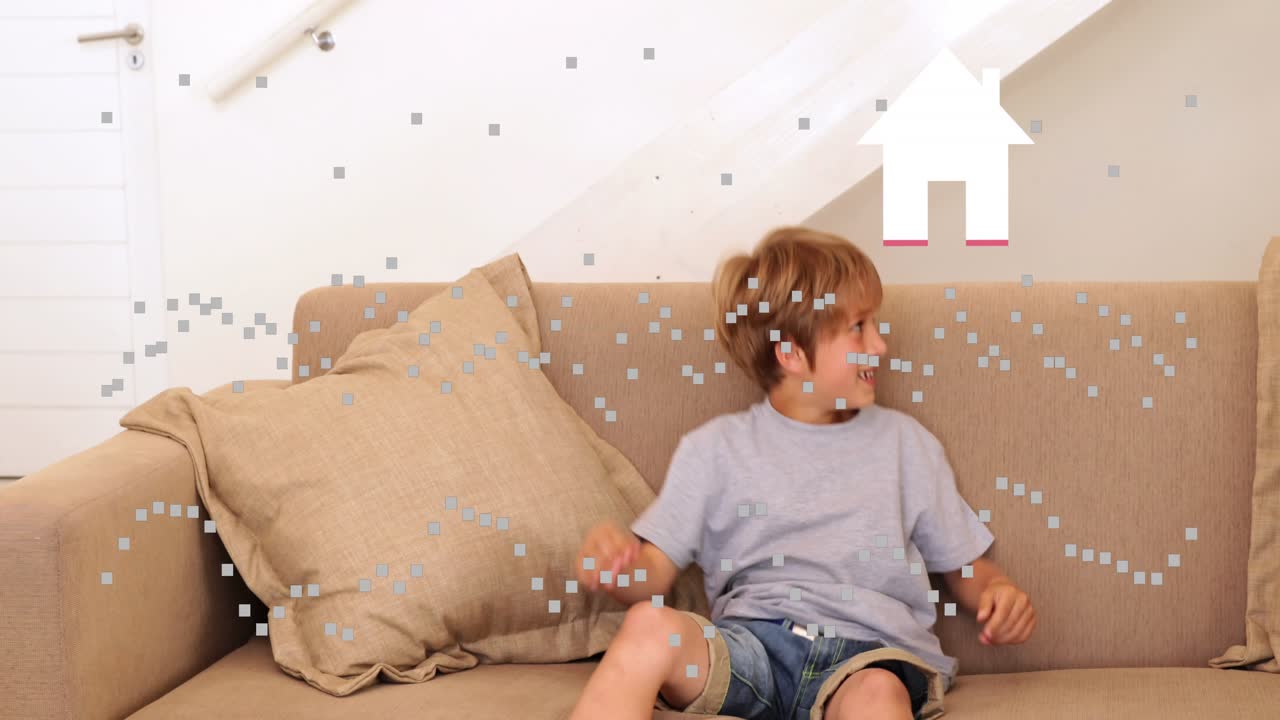 Animation of spots and house over caucasian boy smiling