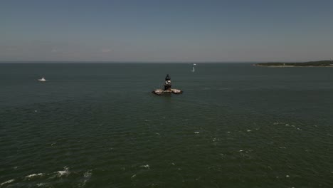 an aerial view the orient point lighthouse off the east end of orient point, ny on a sunny day