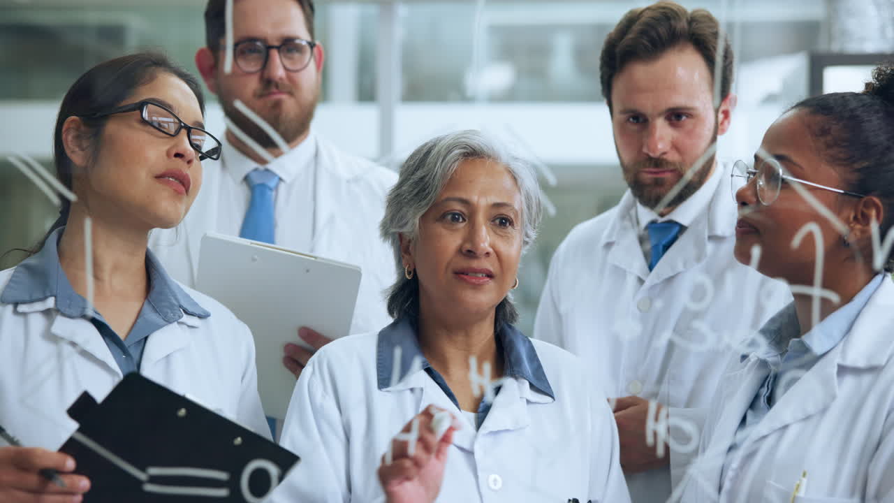 Diverse Team of Scientists Collaborating and Discussing Formulas on a Glass Board