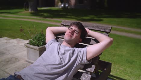 a young boy unwinding in the sunlight - close up