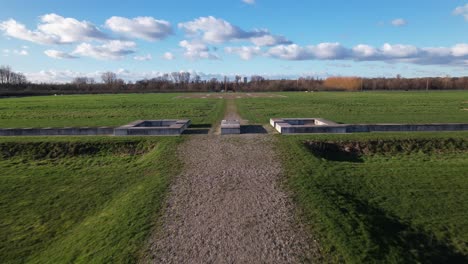 low aerial over entrance and inner space of outlined remains of roman regiment fortification with clear blueprint of the original waterlinie defense settlement
