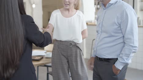 manager meeting with customers in co-working space