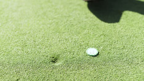 golfing on the putting green