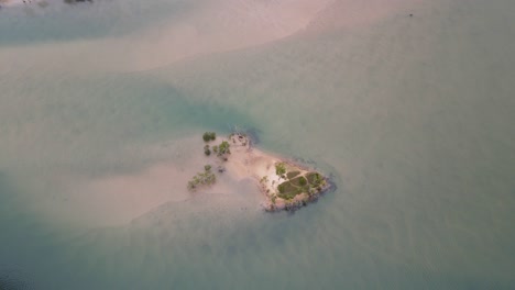 paradise islet in the middle of sandy river water