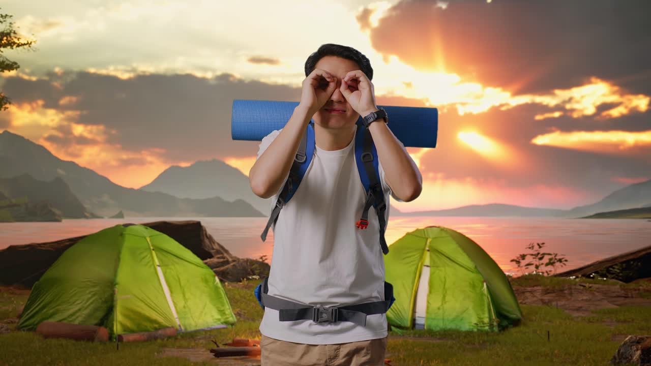 Man Camping at Sunset