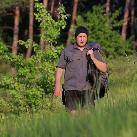 hiker descending on a hill