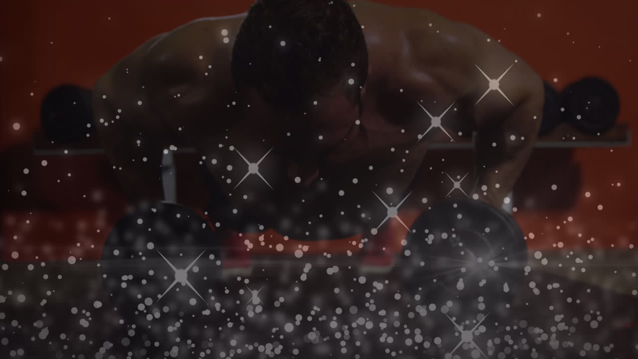 백그라운드 에서 푸시업 을 하는 사람 에 대항 하여 움직이는 은 반 ⁇ 이는 디지털 복합 비디오