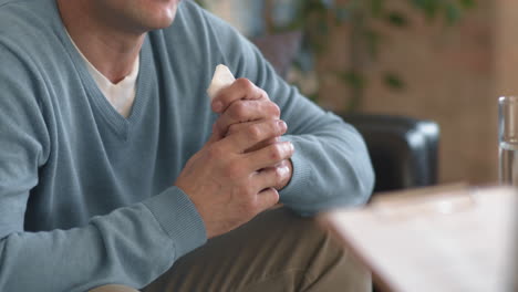 Emotional Man Talking in Therapy Session
