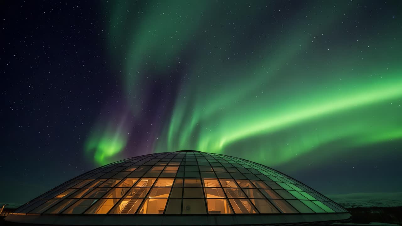 Mesmerizing Aurora Borealis Illuminates a Geometric Dome Under Starry Skies, Capturing Nature's Magic in Vibrant Green Hues Above a Modern Structure